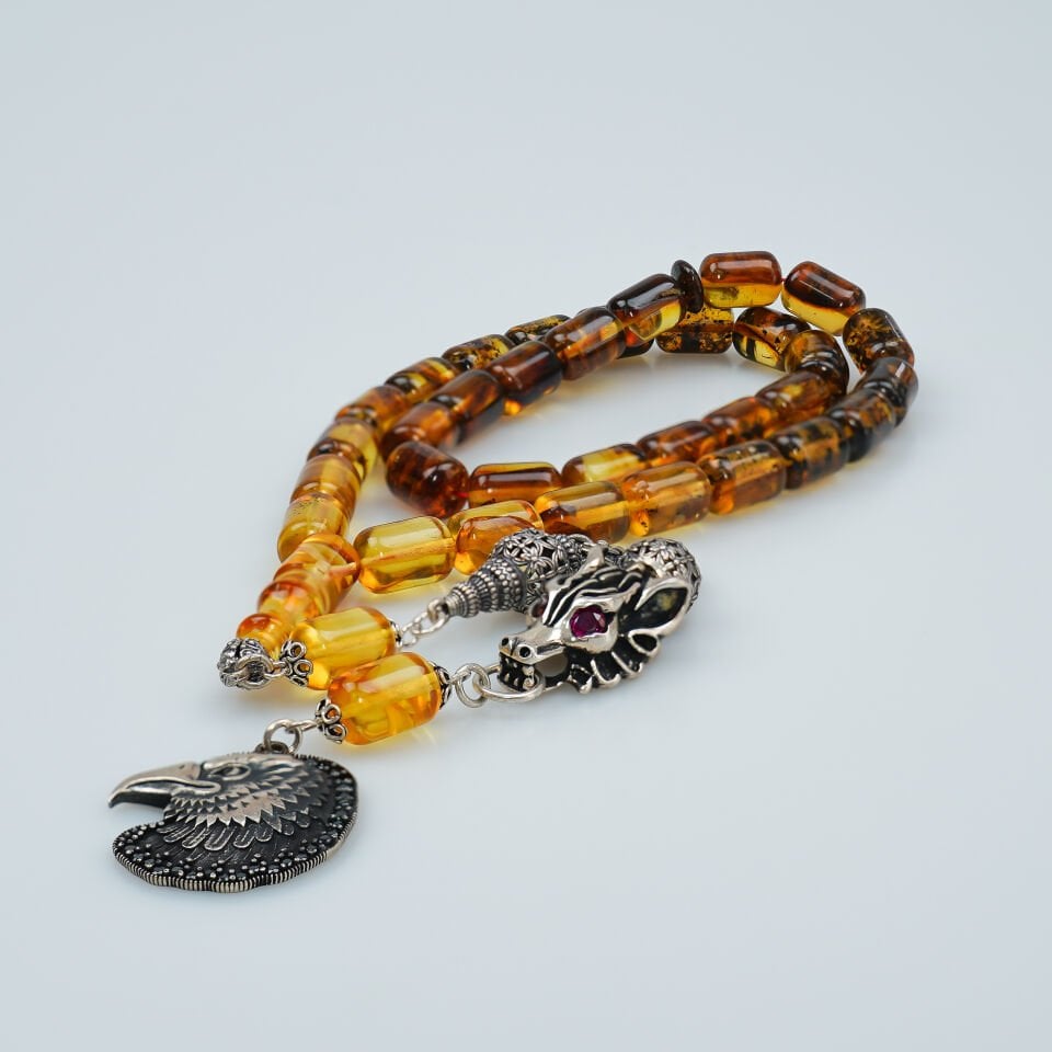 Gümüş Kurt ve Kartal Figürlü Fosilli Damla Kehribar Tesbih