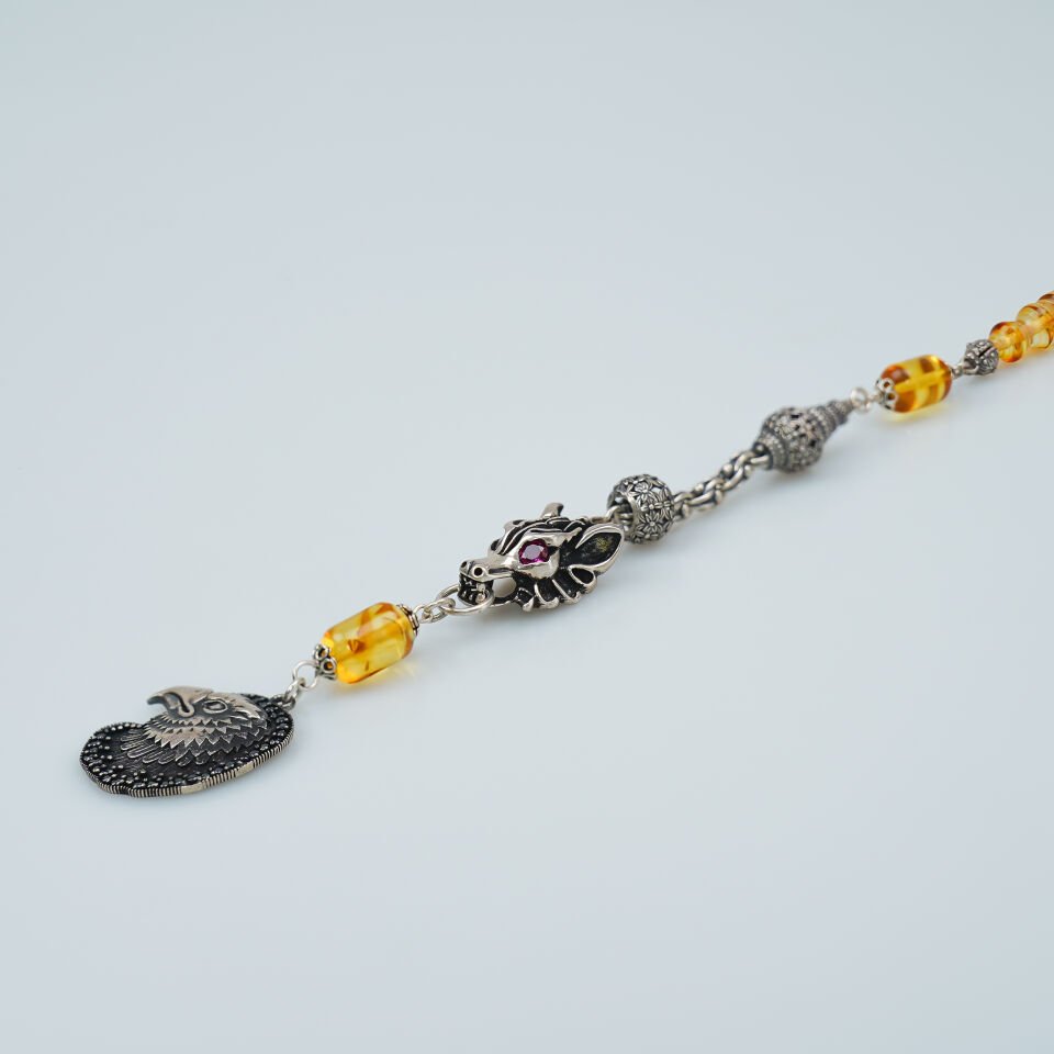 Gümüş Kurt ve Kartal Figürlü Fosilli Damla Kehribar Tesbih