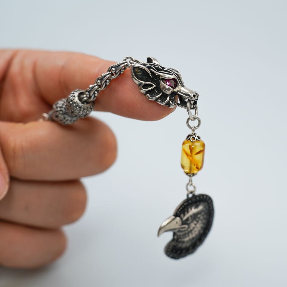 Gümüş Kurt ve Kartal Figürlü Fosilli Damla Kehribar Tesbih