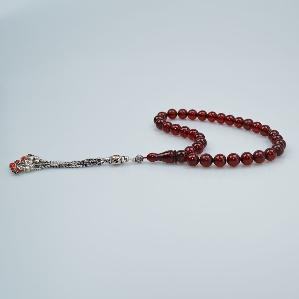 Gümüş Püsküllü Küre Kesim Sıkma Kehribar Tesbih