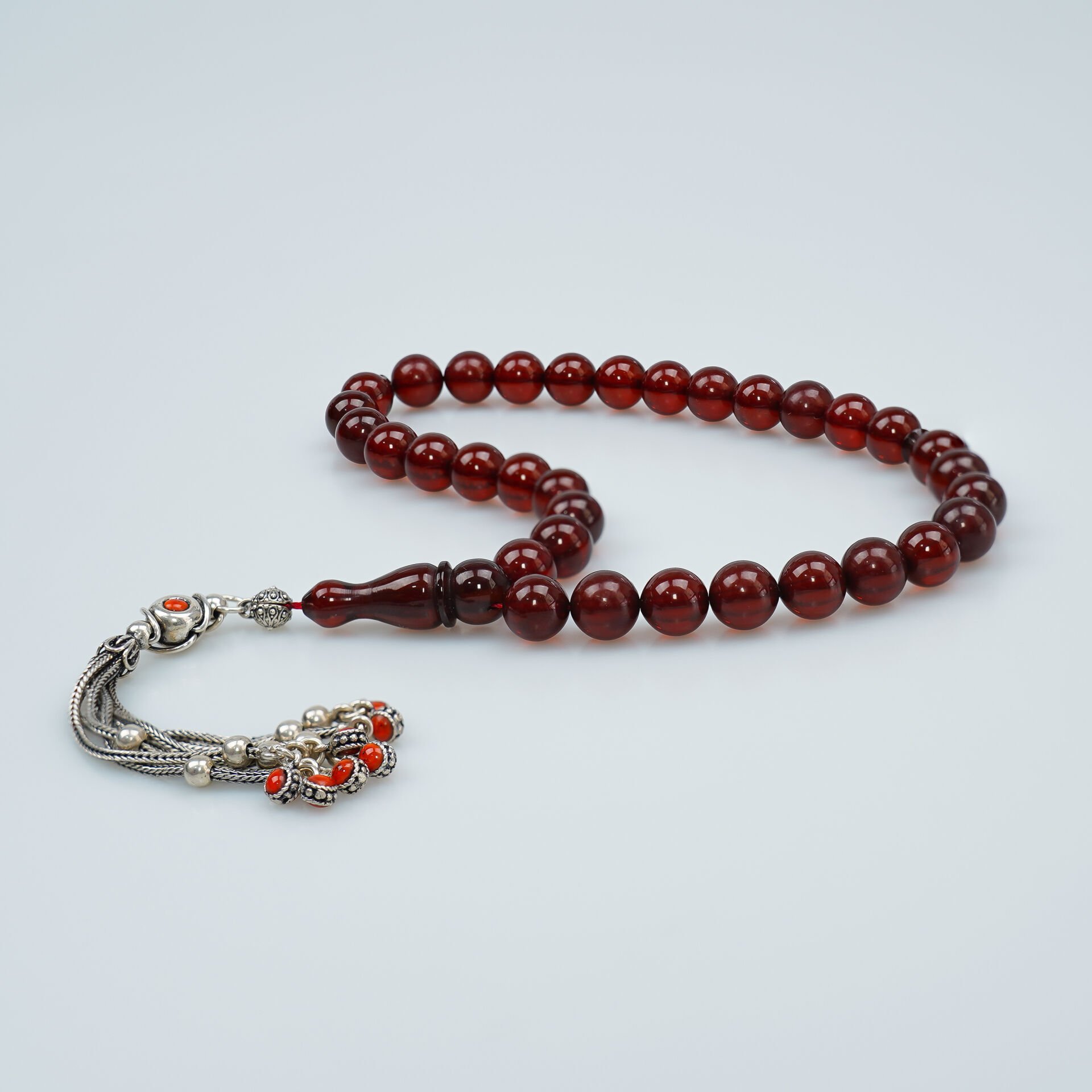 Gümüş Püsküllü Küre Kesim Sıkma Kehribar Tesbih